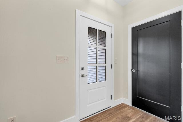 410 Roosevelt, Warrenton, MO 63383 - entryway with wood finished floors and baseboards