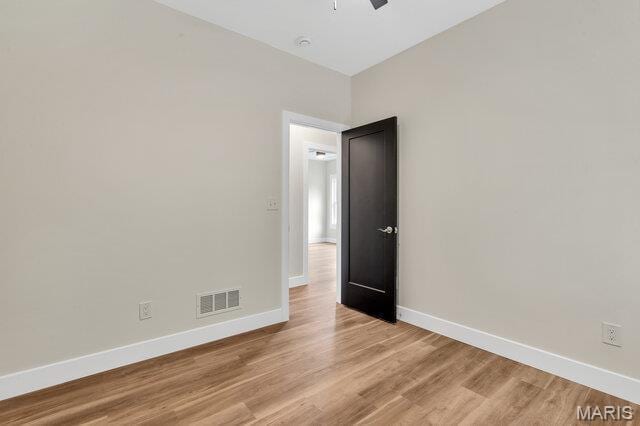 410 Roosevelt, Warrenton, MO 63383 - unfurnished room featuring light wood-style flooring and ceiling fan