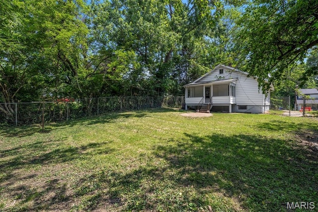 1323 Fairview Ave, University City, MO 63130 - view of yard featuring a sunroom