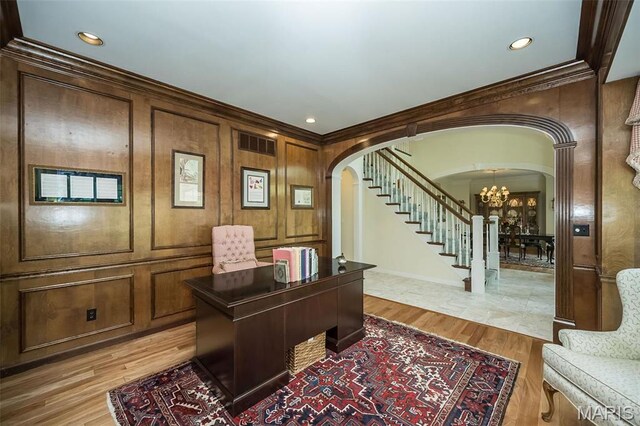 1417 Wheatfield Ln, Saint Albans, MO 63073 - office featuring arched walkways, a chandelier, crown molding, light wood-type flooring, and recessed lighting