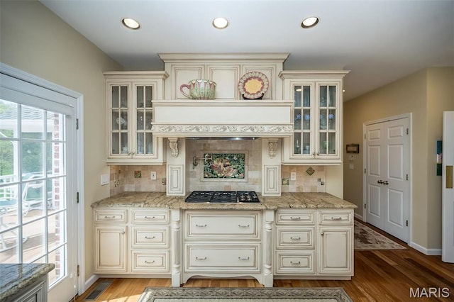 1417 Wheatfield Ln, Saint Albans, MO 63073 - kitchen with gas stovetop, cream cabinetry, healthy amount of natural light, and recessed lighting
