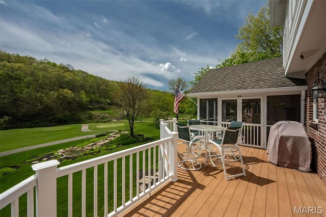 1417 Wheatfield Ln, Saint Albans, MO 63073 - wooden terrace featuring area for grilling, a lawn, and outdoor dining area