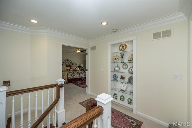 1417 Wheatfield Ln, Saint Albans, MO 63073 - corridor with light colored carpet, ornamental molding, an upstairs landing, built in shelves, and recessed lighting