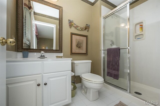 1417 Wheatfield Ln, Saint Albans, MO 63073 - full bathroom featuring a shower stall, tile patterned floors, and vanity