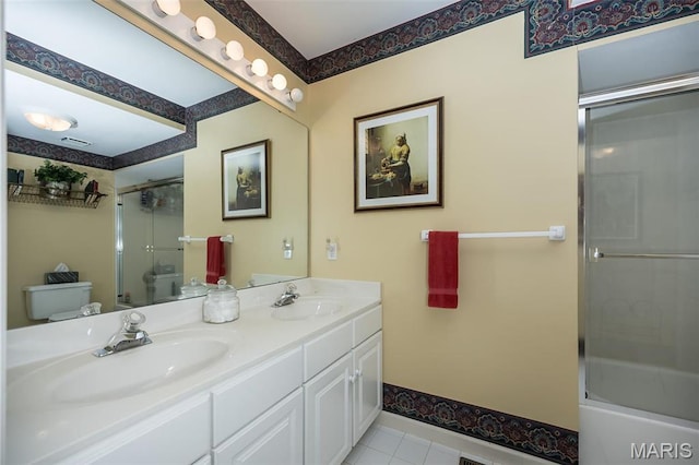 1417 Wheatfield Ln, Saint Albans, MO 63073 - full bath featuring double vanity, tile patterned floors, and combined bath / shower with glass door