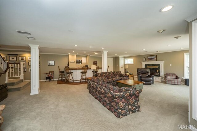 1417 Wheatfield Ln, Saint Albans, MO 63073 - living room with ornate columns, light carpet, a high end fireplace, stairway, and recessed lighting