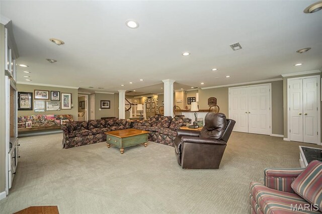 1417 Wheatfield Ln, Saint Albans, MO 63073 - carpeted living room featuring decorative columns, crown molding, recessed lighting, and stairs