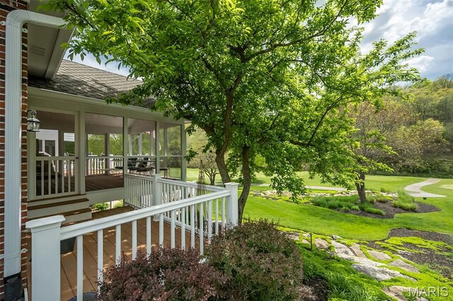 1417 Wheatfield Ln, Saint Albans, MO 63073 - view of green lawn with a sunroom and view of golf course