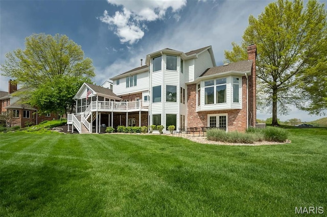 1417 Wheatfield Ln, Saint Albans, MO 63073 - back of property with a chimney, brick siding, stairway, a wooden deck, and a yard