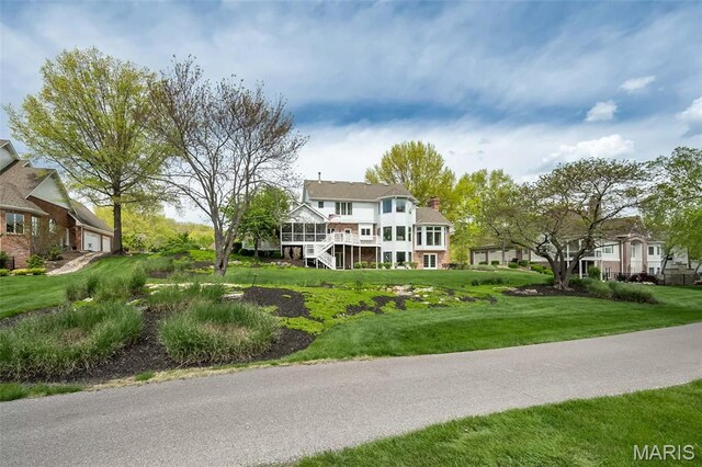 1417 Wheatfield Ln, Saint Albans, MO 63073 - view of front of home featuring a front yard and a residential view