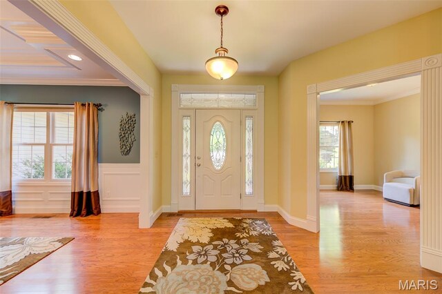4485 Killdeer Dr, Augusta, MO 63332 - entryway featuring plenty of natural light, light wood finished floors, and ornamental molding
