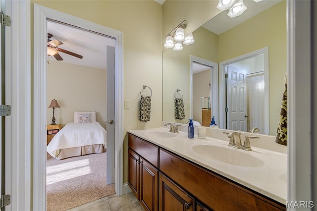 4485 Killdeer Dr, Augusta, MO 63332 - ensuite bathroom featuring double vanity, a ceiling fan, and tile patterned flooring