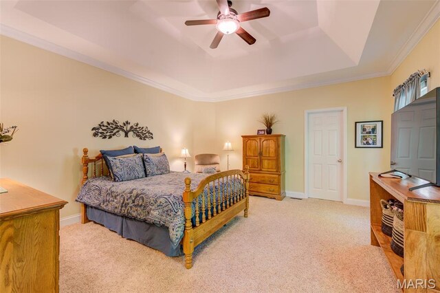 4485 Killdeer Dr, Augusta, MO 63332 - bedroom featuring a tray ceiling, light colored carpet, crown molding, and a ceiling fan