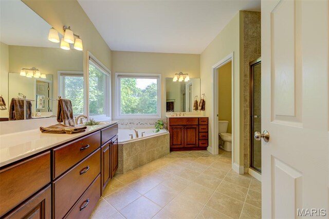 4485 Killdeer Dr, Augusta, MO 63332 - bathroom featuring vanity, a garden tub, a stall shower, and tile patterned flooring