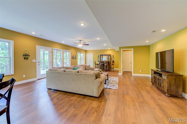 4485 Killdeer Dr, Augusta, MO 63332 - living room featuring wood finished floors, plenty of natural light, recessed lighting, and a ceiling fan