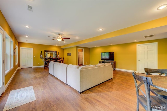 4485 Killdeer Dr, Augusta, MO 63332 - living area featuring light wood finished floors, recessed lighting, and ceiling fan