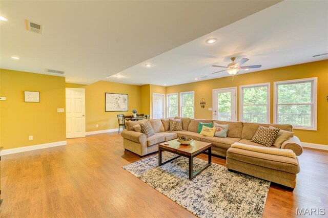 4485 Killdeer Dr, Augusta, MO 63332 - living room featuring wood finished floors, ceiling fan, and recessed lighting