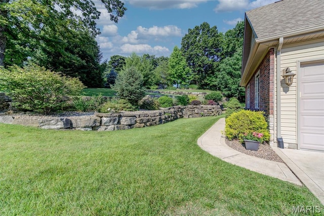 4485 Killdeer Dr, Augusta, MO 63332 - view of green lawn with a garage