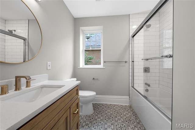 2910 Allen Ave, Saint Louis, MO 63104 - full bathroom featuring vanity, shower / bath combination with glass door, and tile patterned flooring