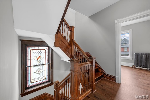 2910 Allen Ave, Saint Louis, MO 63104 - stairway with radiator and wood finished floors