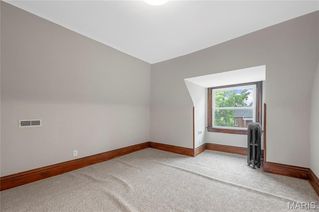 2910 Allen Ave, Saint Louis, MO 63104 - additional living space with carpet floors and radiator