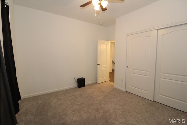 241 Dell View Dr, Arnold, MO 63010 - unfurnished bedroom featuring carpet, a closet, and a ceiling fan