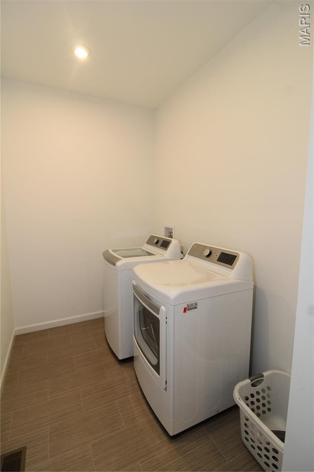 241 Dell View Dr, Arnold, MO 63010 - washroom featuring washer and clothes dryer and baseboards