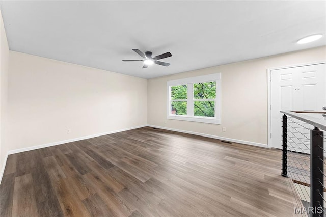 2019 San Pedro Dr, Arnold, MO 63010 - unfurnished living room with a ceiling fan and wood finished floors