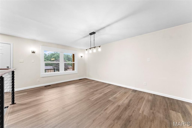 2019 San Pedro Dr, Arnold, MO 63010 - unfurnished dining area with wood finished floors and baseboards