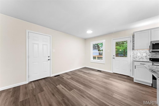 2019 San Pedro Dr, Arnold, MO 63010 - unfurnished living room featuring wood finished floors and recessed lighting