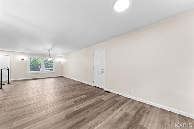 2019 San Pedro Dr, Arnold, MO 63010 - unfurnished living room featuring wood finished floors