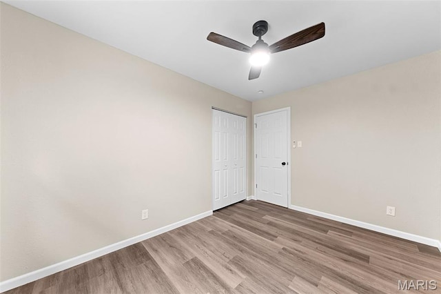 2019 San Pedro Dr, Arnold, MO 63010 - unfurnished bedroom with wood finished floors, a closet, and ceiling fan