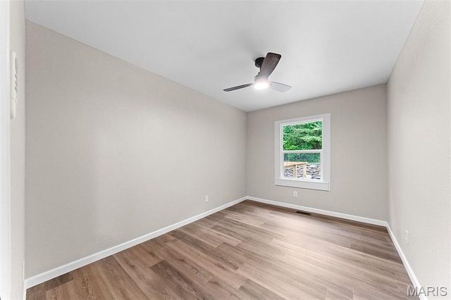 2019 San Pedro Dr, Arnold, MO 63010 - spare room featuring light wood-style flooring and a ceiling fan