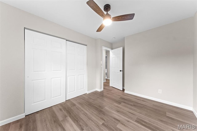 2019 San Pedro Dr, Arnold, MO 63010 - unfurnished bedroom featuring wood finished floors, a closet, and ceiling fan