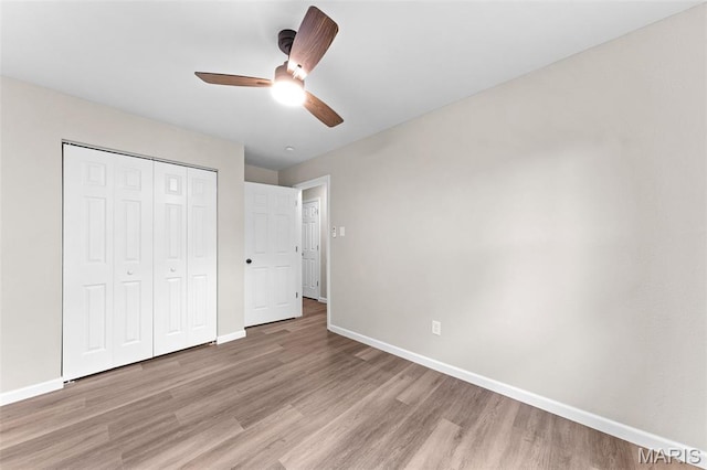2019 San Pedro Dr, Arnold, MO 63010 - unfurnished bedroom featuring light wood finished floors, a closet, and a ceiling fan