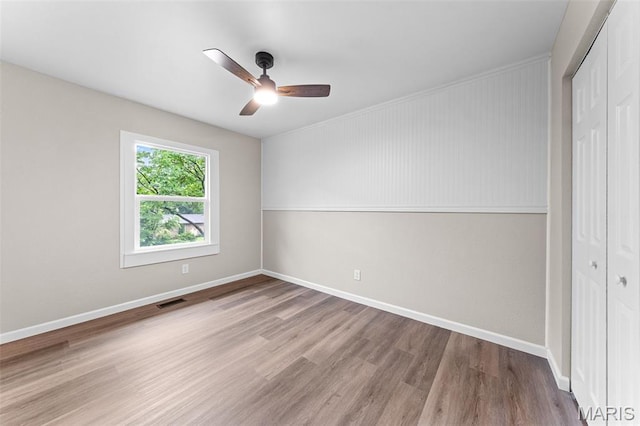 2019 San Pedro Dr, Arnold, MO 63010 - unfurnished bedroom with a closet, wood finished floors, and a ceiling fan