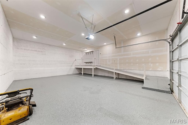 2019 San Pedro Dr, Arnold, MO 63010 - garage featuring a garage door opener and recessed lighting