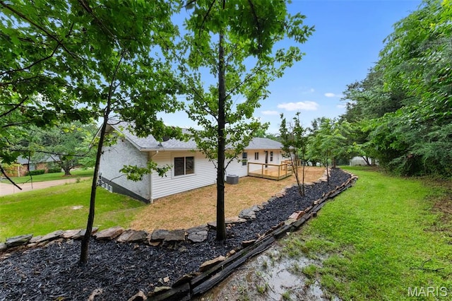 2019 San Pedro Dr, Arnold, MO 63010 - rear view of property featuring a yard