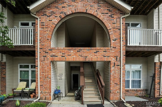1275 Gardens Circle Drive E, Saint Louis, MO 63125 - entrance to property featuring a balcony and brick siding