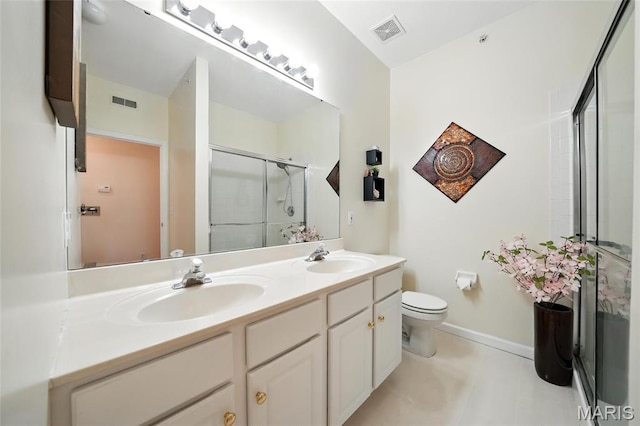 1275 Gardens Circle Drive E, Saint Louis, MO 63125 - bathroom featuring a stall shower, double vanity, and tile patterned flooring