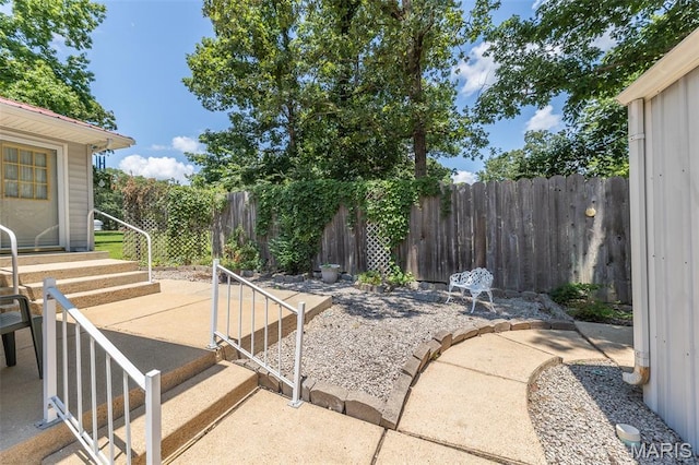 39 Rock Ridge Rd, Wappapello, MO 63966 - fenced backyard featuring a patio and entry steps