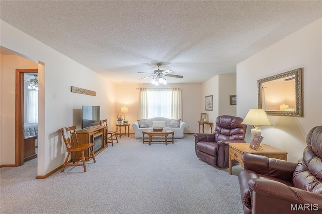 39 Rock Ridge Rd, Wappapello, MO 63966 - living room featuring light colored carpet, ceiling fan, and a textured ceiling