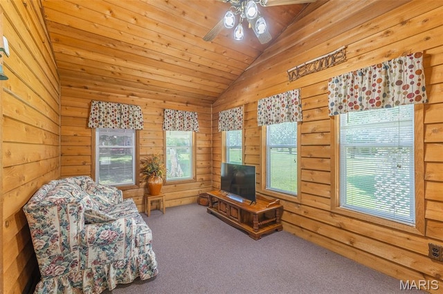 39 Rock Ridge Rd, Wappapello, MO 63966 - living area featuring lofted ceiling, carpet floors, ceiling fan, and wood walls