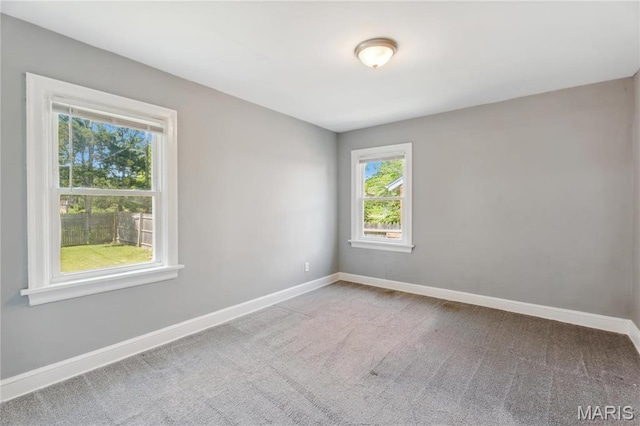 6838 Raymond Ave, Saint Louis, MO 63130 - carpeted empty room featuring baseboards