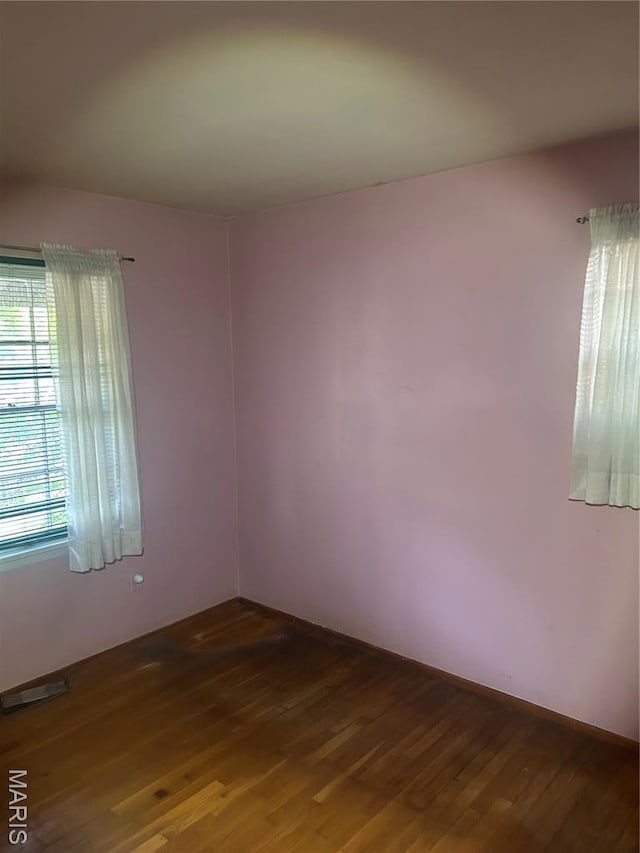 7250 Howdershell Rd, Hazelwood, MO 63042 - spare room featuring wood finished floors