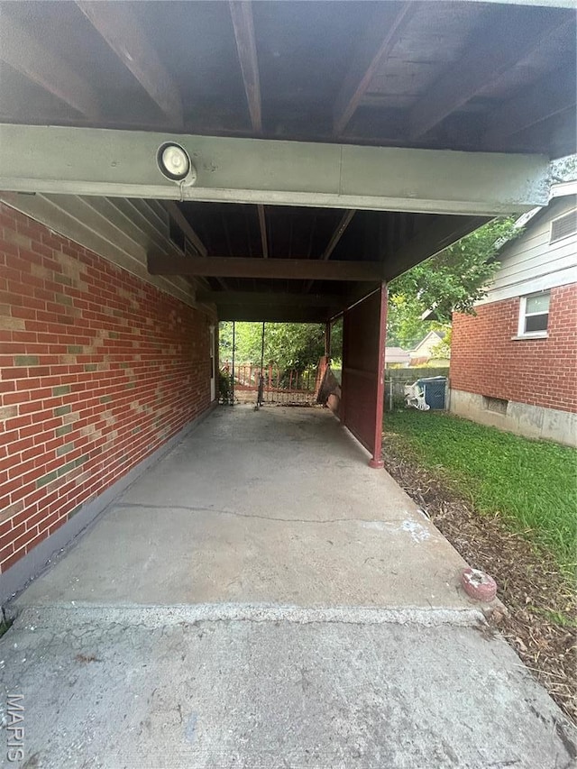 7250 Howdershell Rd, Hazelwood, MO 63042 - view of vehicle parking with a carport