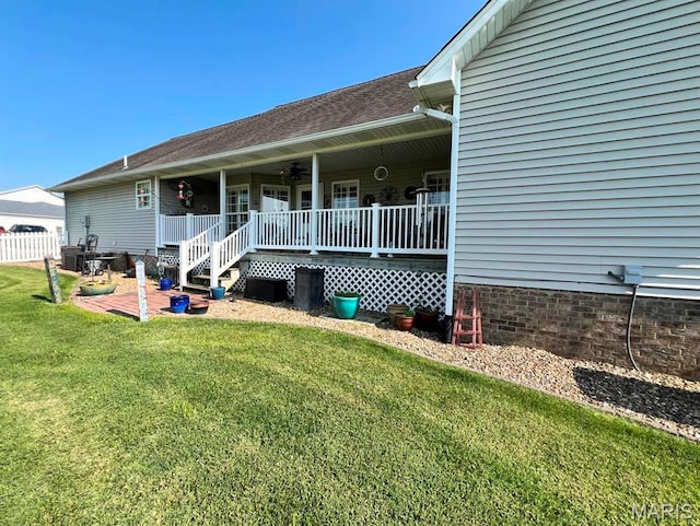 2302 Stonebrook, Dexter, MO 63841 - back of house featuring a lawn, covered porch, and ceiling fan