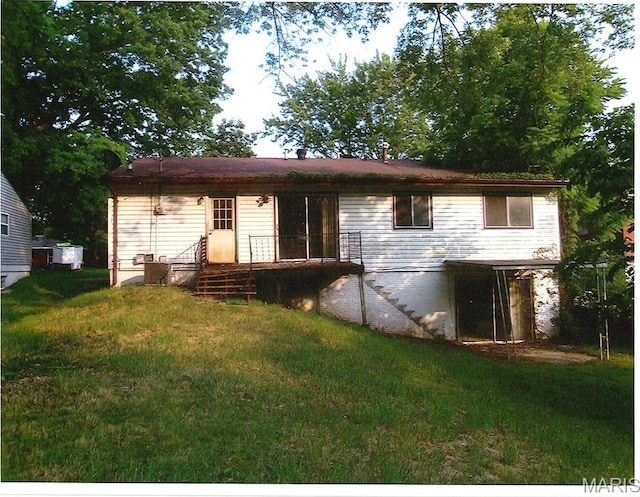 33 Potomac Dr, Fairview Heights, IL 62208 - back of property featuring a lawn