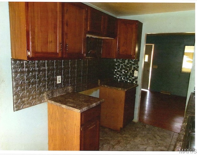 33 Potomac Dr, Fairview Heights, IL 62208 - kitchen featuring tasteful backsplash and dark countertops