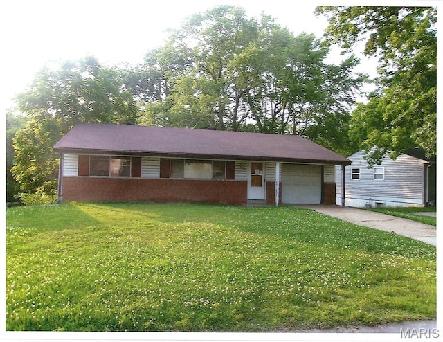 33 Potomac Dr, Fairview Heights, IL 62208 - ranch-style house with concrete driveway, a front yard, and a garage